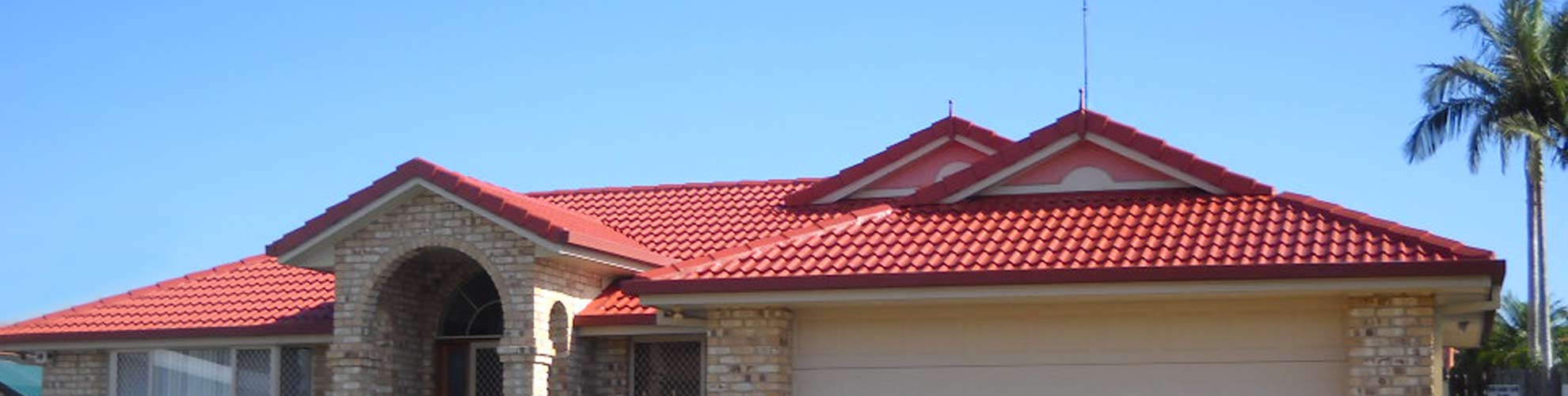 tile-roof-painted-red-by-nevs-roof-restoration
